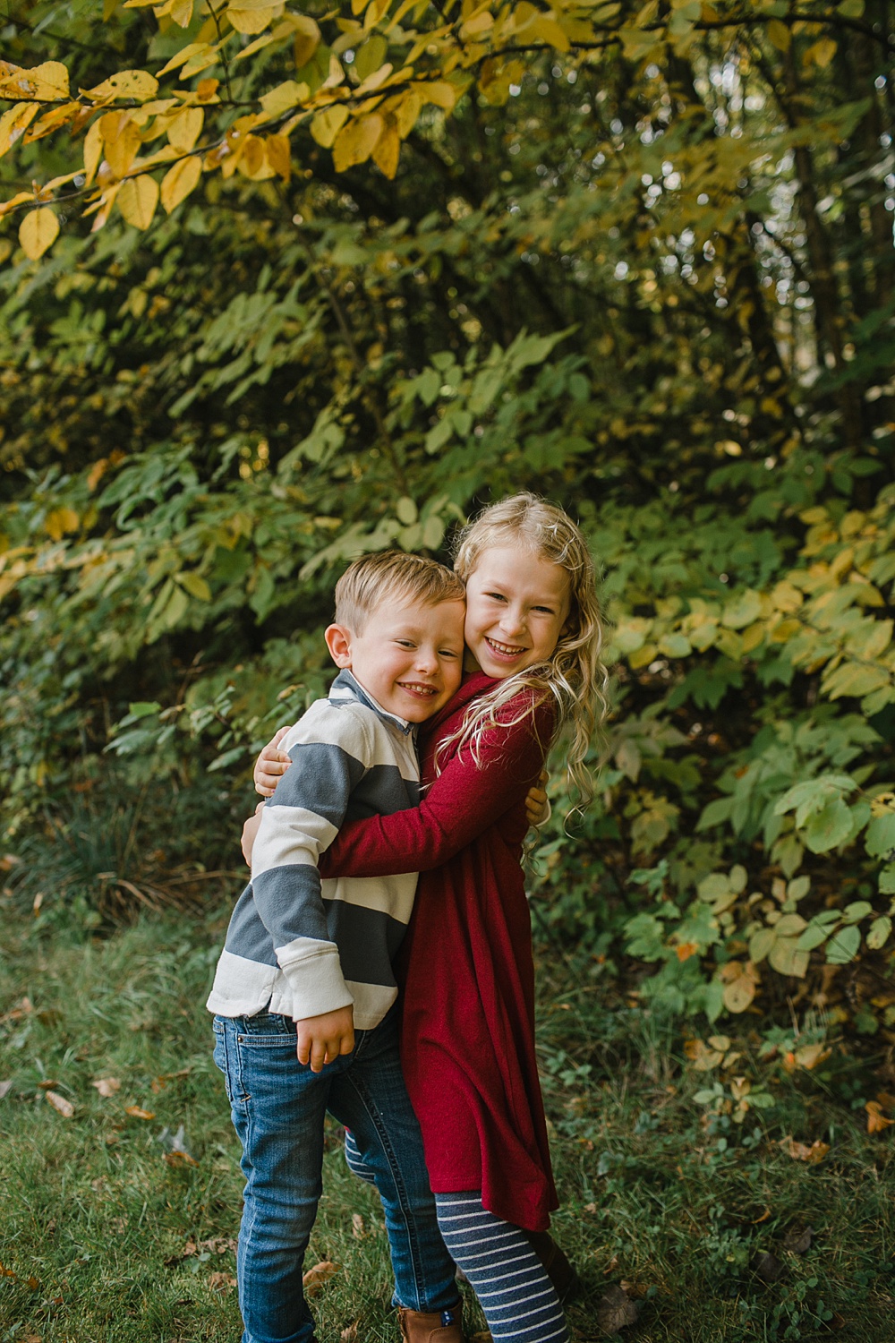 Vermont brother and sister in the foliage by Vermont family photographer
